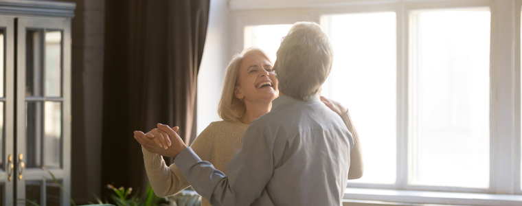 couple dancing in new home