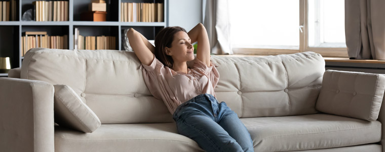 woman relaxing on couch