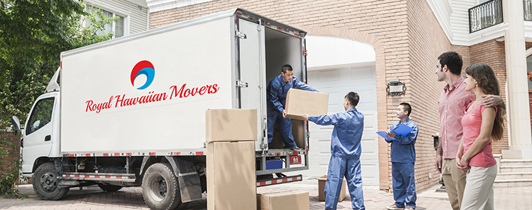 Happy couple watching Royal Hawaiian Movers load a moving van